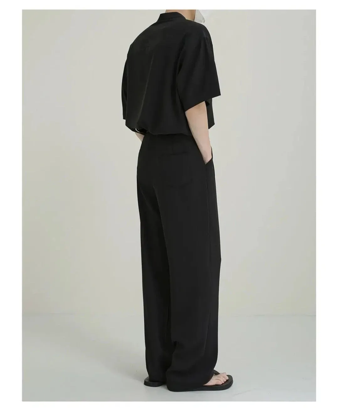 Relaxed Fit Pleated Trousers