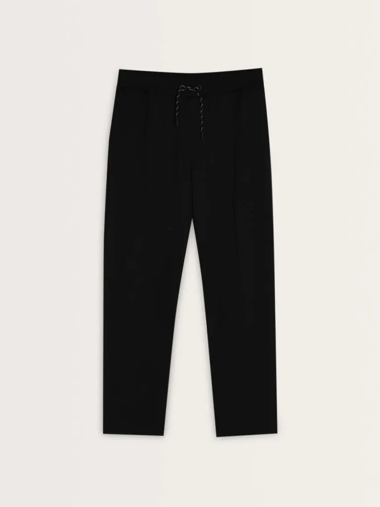 Studiofit Solid Black Relaxed-Fit Mid-Rise Track Pants